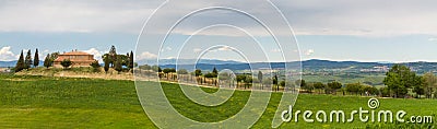 Tuscany farmhouse with Cypress alley near Siena, Italy Stock Photo