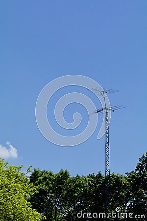 TV Antenna Against the Sky Vertical Stock Photo