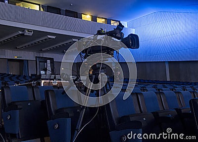 Tv camera in a concert hal. Professional digital video camera. Stock Photo