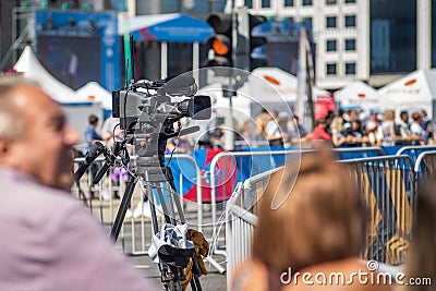 TV Camera Operator at the live event Editorial Stock Photo