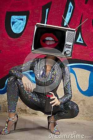 Tv head woman and graffiti wall Editorial Stock Photo
