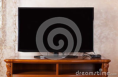 TV is off which is located in a in the modern living room. 3d rendering. Black color tv Stock Photo