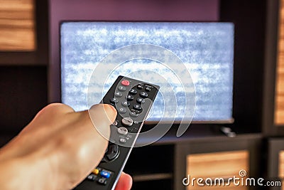 TV remote control, interference on screen television set Stock Photo