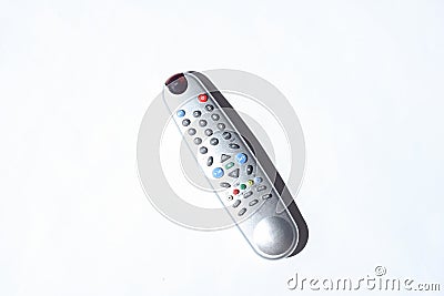 Tv remote on a white background. Photo with shadows, hard light. Top View. Editorial Stock Photo