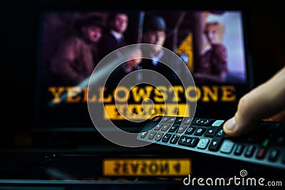 TV series Yellowstone and TV remote controler. TV show Yellowstone is made by Paramount Network Editorial Stock Photo