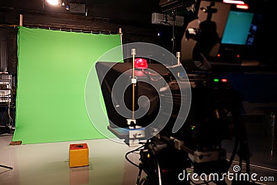 TV studio. Camcorder and green chromakey. Shooting television press news and movies Stock Photo