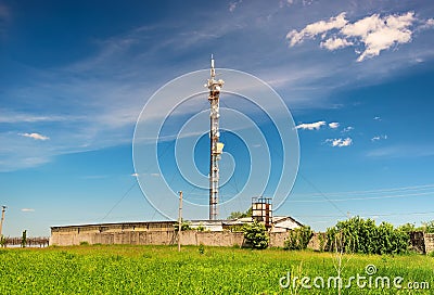 TV tower on green field Stock Photo