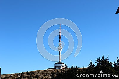 Tv tower and lookout tower on the top of the mountain Stock Photo