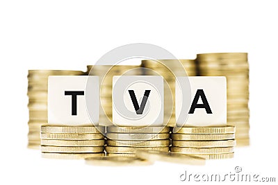 TVA (Value Added Tax) on Piles of Gold Coins with a White Background Stock Photo