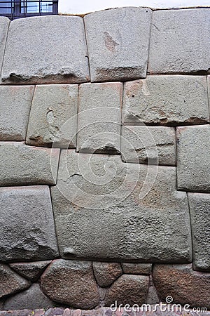 Twelve sided stone in the Inca Wall. Finest Example of Inca masonry and skill Stock Photo