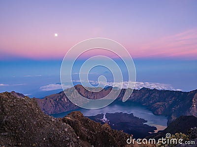 Twilight around the volcano crater at Mount Rinjani summit Gunung Rinjani Stock Photo