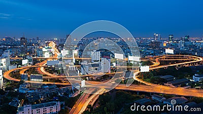 Twilight city highway intersection with blue sky Stock Photo