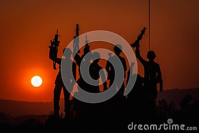 Twilight landscape silhouette military and gun Stock Photo