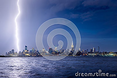 Twilight lightning strike in Midtown Manhattan, New York City skyscrapers Editorial Stock Photo