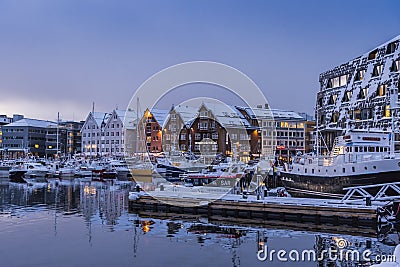 TromsÃ¸ harbour twilight wintertime Editorial Stock Photo