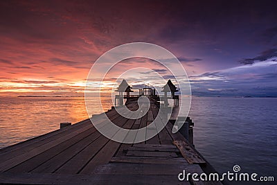 Twilight sunset wood bridge at Djittabhawan Temple Stock Photo