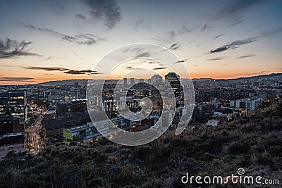 Twilight view of the south-western districts of the city of Barcelona in Spain Editorial Stock Photo