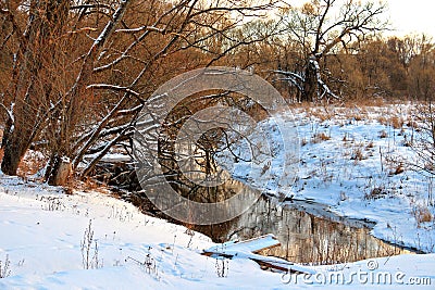 Twilight winter sunset on rural river Stock Photo