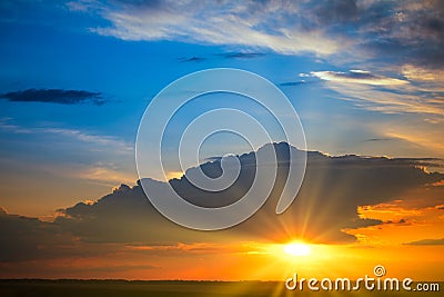 Dusk Delight: Captivating Colors of the Evening Sunset Stock Photo