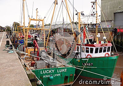 Shellfishing boats in Kings Lynn fishing fleet. Editorial Stock Photo