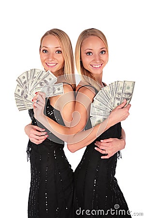 Twin girls with Dollars Stock Photo