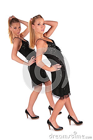 Twin girls. Incline behind hand up. Stock Photo