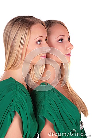 Twin girls sideview Stock Photo