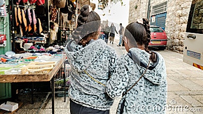 Backstreet twins at the market Editorial Stock Photo