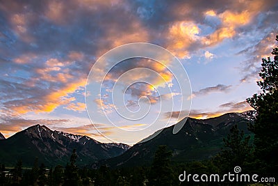 Twin lake sunset cloudscape alpine glow amber bliss Stock Photo