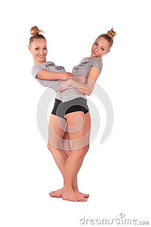 Twin sport girls stands Stock Photo