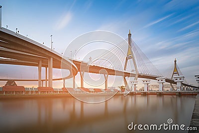 Twin suspension bridge reflection water front Stock Photo