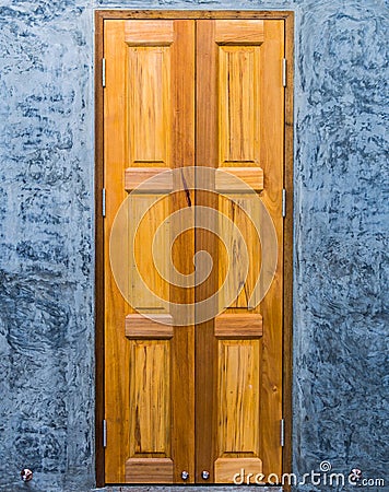 Twin teak door Stock Photo