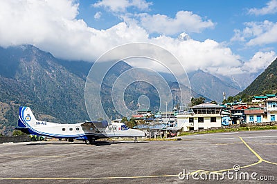 Twin turboprop Dornier airplane in Tenzing-Hillary airport Lukla Nepal Editorial Stock Photo