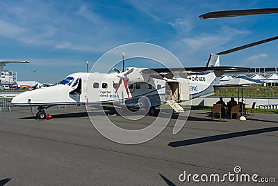 A twin-turboprop STOL utility aircraft, Dornier 228 New Generation. Editorial Stock Photo