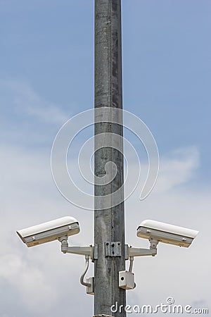 Twins Security camera on the metal pole Stock Photo