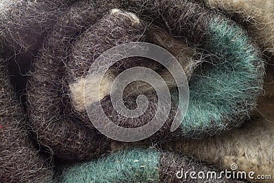 Twisted colorful woolen blanket. Homemade woolen plaid Stock Photo