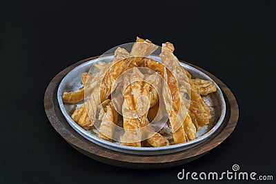 Twisted Khari an Indian snack with honey Stock Photo