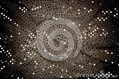 Twisted silver grey sequined fabric background Stock Photo