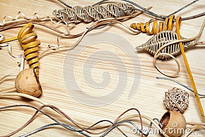 Twisted threads, woven ball, wooden bowls, decorative braided twisted trinkets Stock Photo