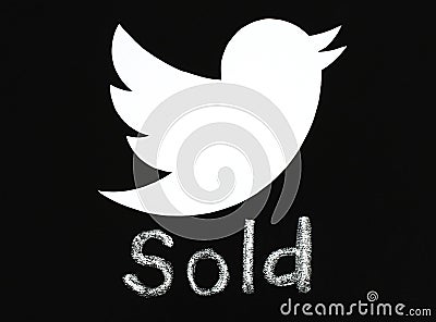 Twitter bird logo printed on paper and put on blackboard with ch Editorial Stock Photo