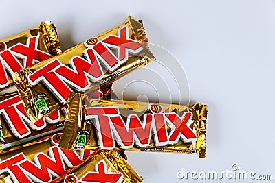 Twix candy bars with caramel and milk chocolate made by Mars, Inc. on white background Editorial Stock Photo