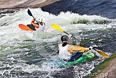 Two active kayakers Stock Photo