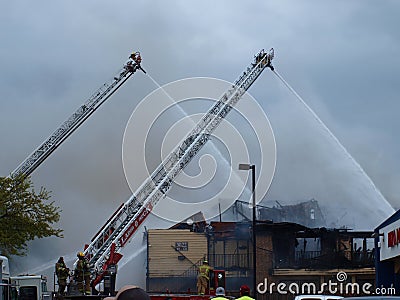 Two Aerial Ladders Aim Their Water Cannons Editorial Stock Photo