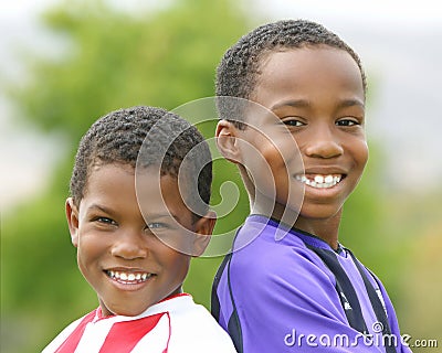 Two African American Boys in Soccer Uniforms Stock Photo