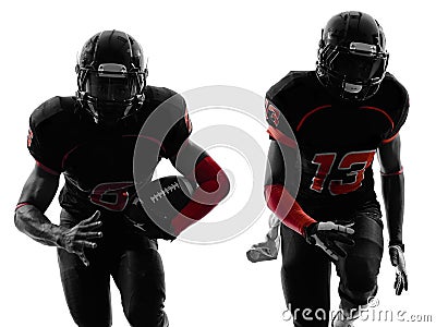 Two american football players running silhouette Stock Photo