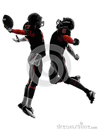 Two american football players touchdown celebration silhouette Stock Photo