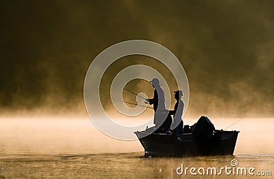 Two Anglers Fishing on A Lake Stock Photo