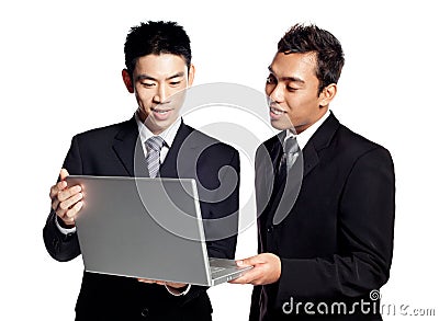 Two Asian Businessmen share business information Stock Photo