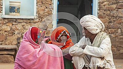 Two Asian Indian Women and Man In Conversation Editorial Stock Photo