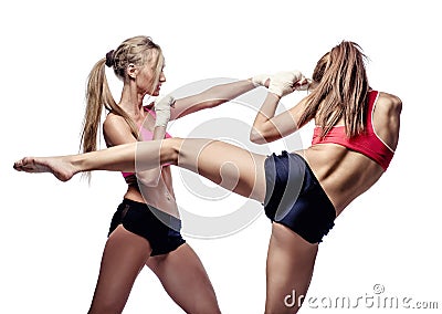 Two attractive athletic girls fighting Stock Photo